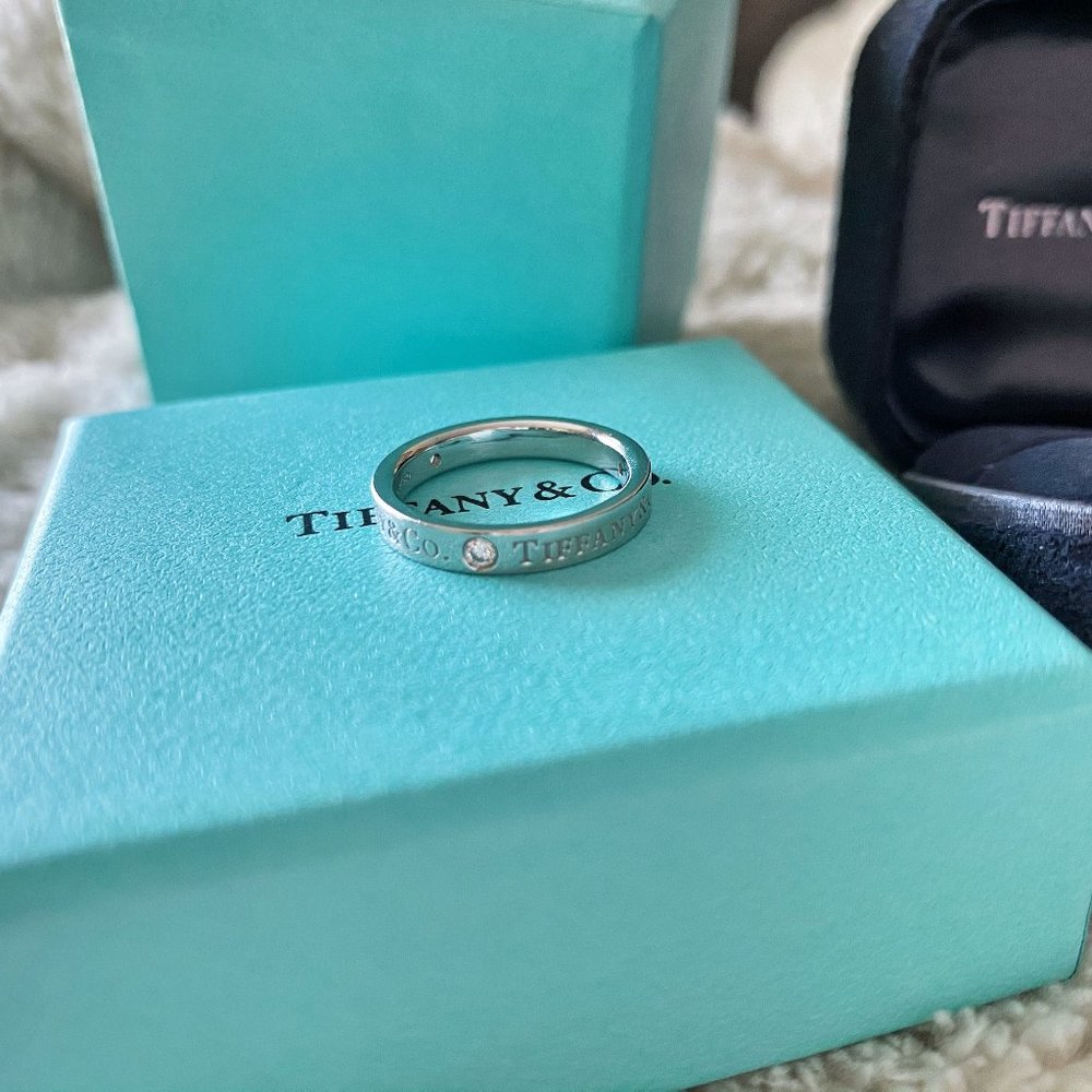 Tiffany band ring with diamonds in platinum